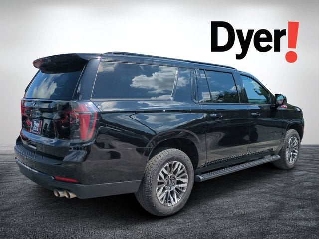 2025 Chevrolet Suburban — rear three-quarter view