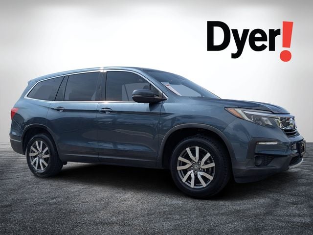 2021 Honda Pilot EX-L in Obsidian Blue Pearl — front three-quarter view