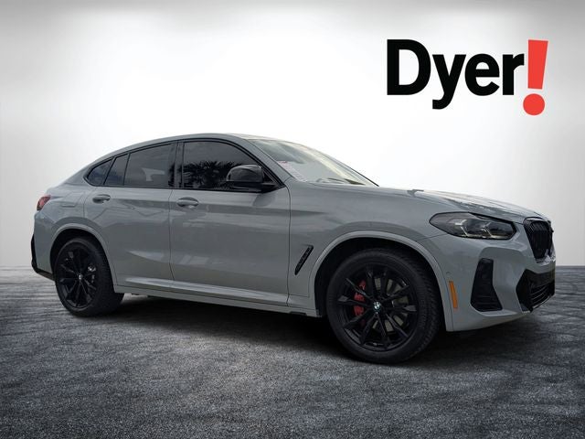 2023 BMW X4 M40i in Brooklyn Gray Metallic — front three-quarter view