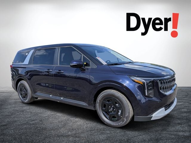 2026 Kia Carnival LXS in Deep Chroma Blue — front three-quarter view