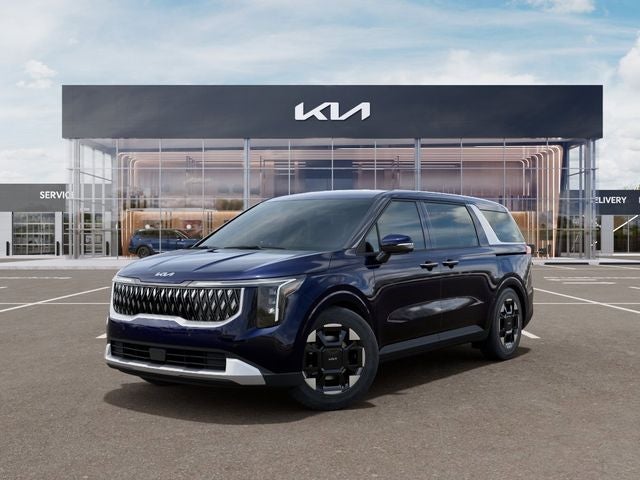 2026 Kia Carnival EX in Deep Chroma Blue — front three-quarter view