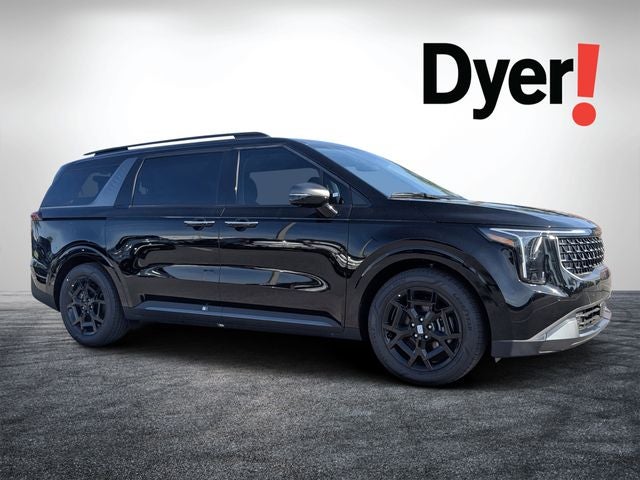 2026 Kia Carnival SX Prestige in Aurora Black Pearl — front three-quarter view
