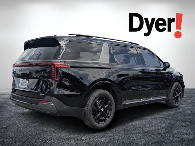 2026 Kia Carnival Hybrid — rear three-quarter view