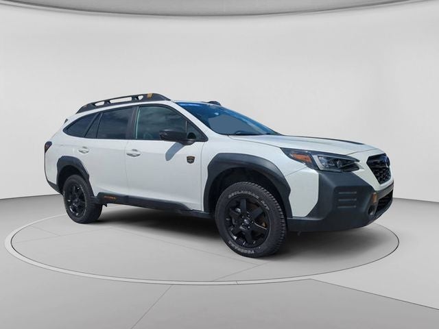 2023 Subaru Outback Wilderness in Crystal White Pearl — front three-quarter view