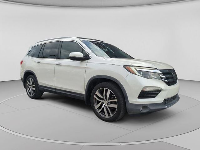 2017 Honda Pilot Elite in White Diamond Pearl — front three-quarter view