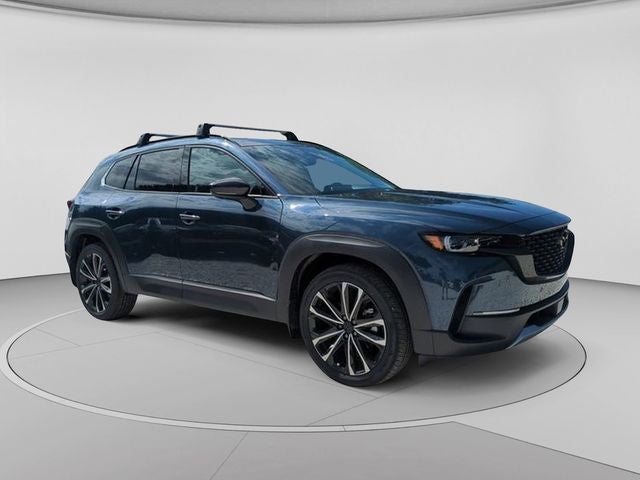 2026 Mazda Mazda CX-50 2.5 Turbo Premium Plus AWD in Ingot Blue Metallic — front three-quarter view