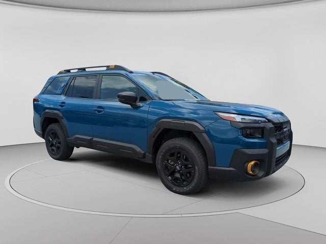 2026 Subaru Outback Wilderness in Geyser Blue — front three-quarter view