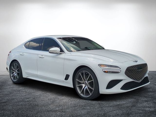 2023 Genesis G70 2.0T in Alta White — front three-quarter view