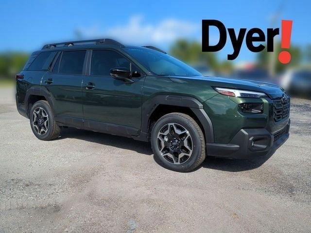 2026 Subaru OUTBACK Touring in Deep Emerald Green Pearl — front three-quarter view